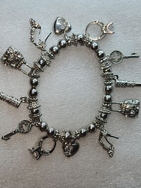 Silvertone Charm Stretch Bracelet with Heart, Shoes, Purse, Lipstick Ring & Key